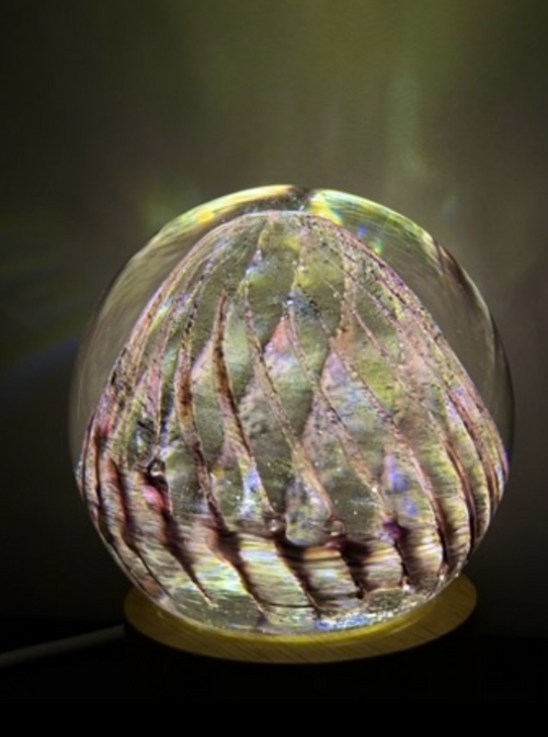 Decorative handmade glass orb lamp with purple design